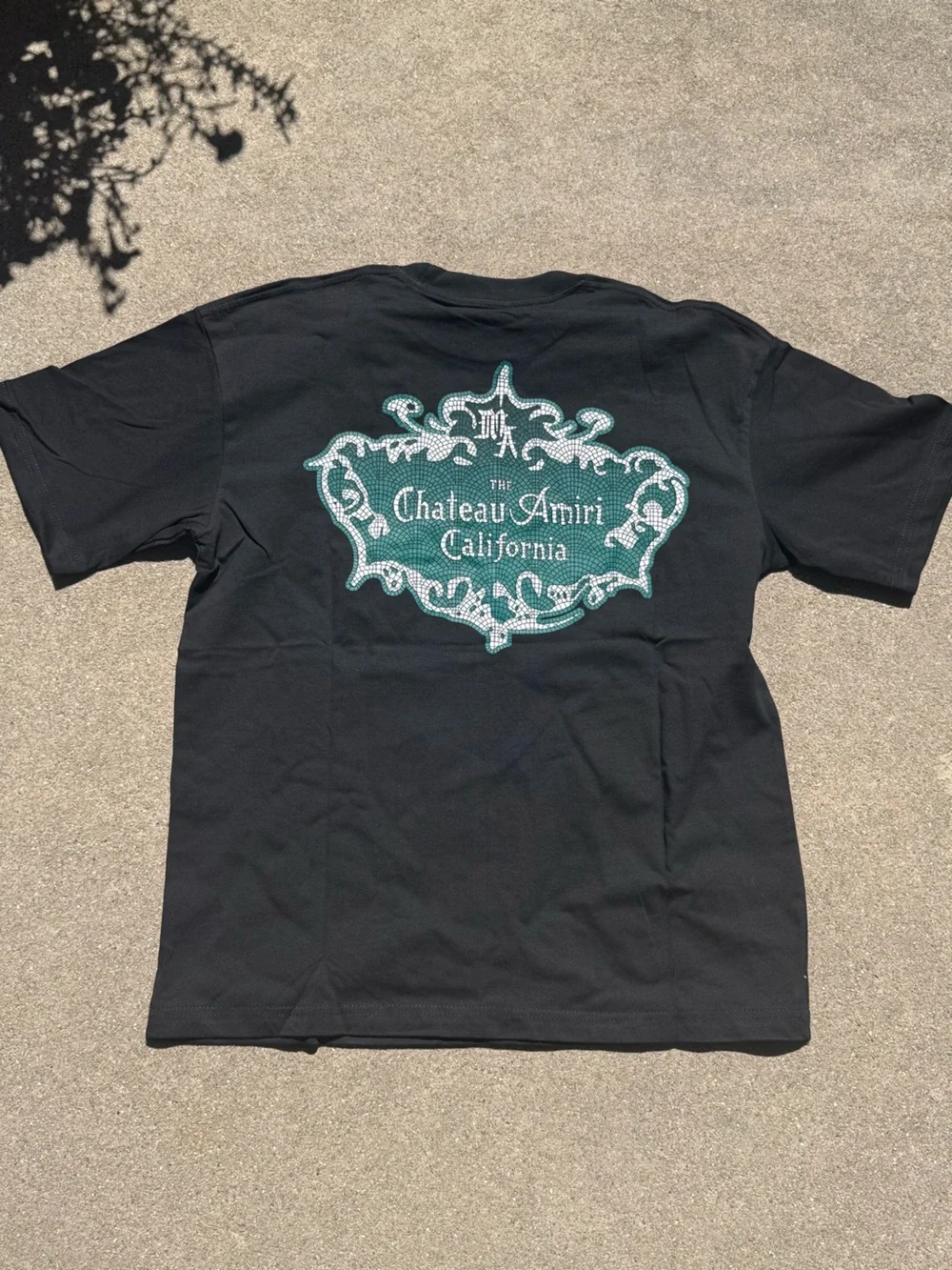 AMIRI Black T‑Shirt with Teal Crest Logo
